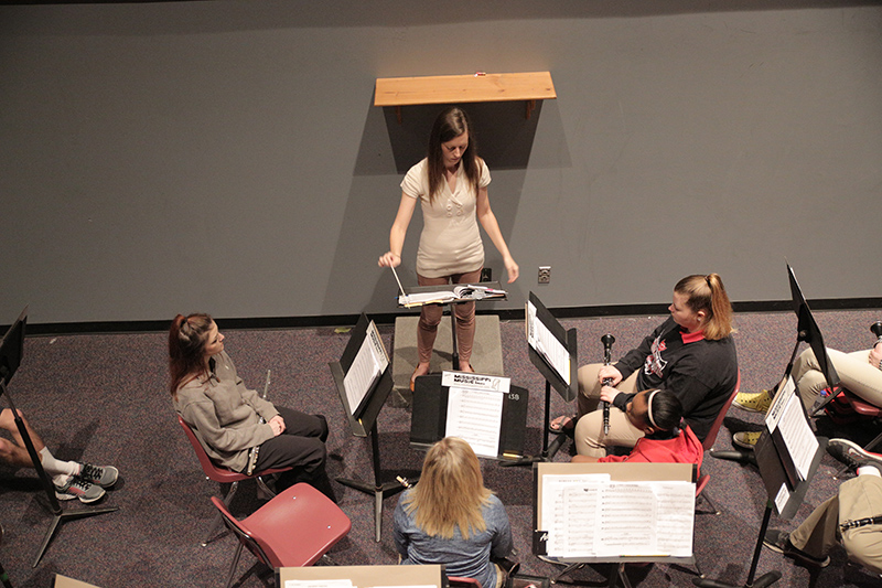 Brittany Swindoll conducting for musicians.